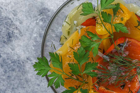 fresh and colorful bell pepper on wooden boardの写真素材