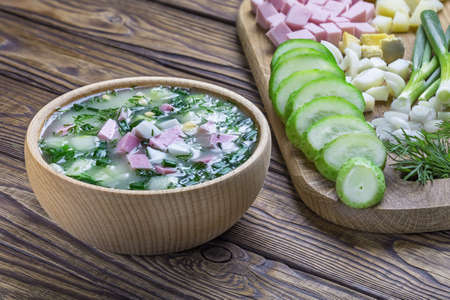 Okroshka is a cold summer soup with radish, cucumber and dill.の写真素材