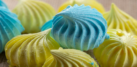 delicious and sweet meringue yellow and blueの写真素材