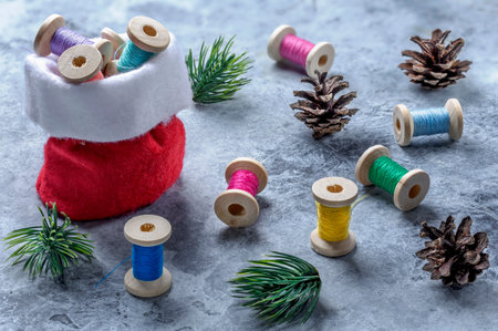 New Year's gift with colored sewing threads on bobbins