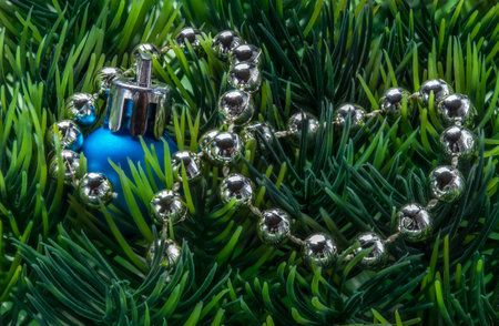 Christmas tree toy and garland on Christmas background.の写真素材