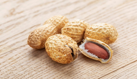 Peanut. A pod of peanut beans. close-up. On a wooden table.