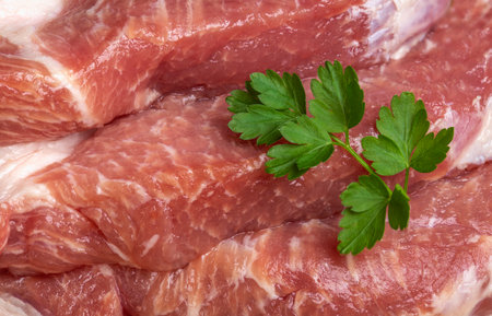 Fresh sliced raw pork. large pieces of meatの写真素材