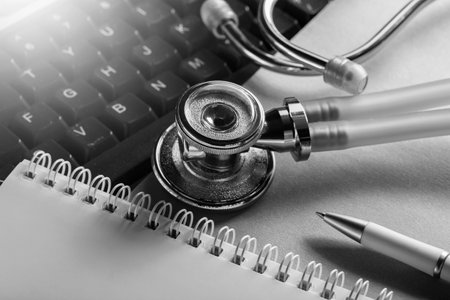 Online medical stethoscope on computer keyboard. modern medicine.の写真素材