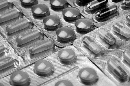 medical pills on black and white backgroundの写真素材