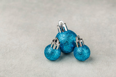 blue Christmas tree balls toys on a light background