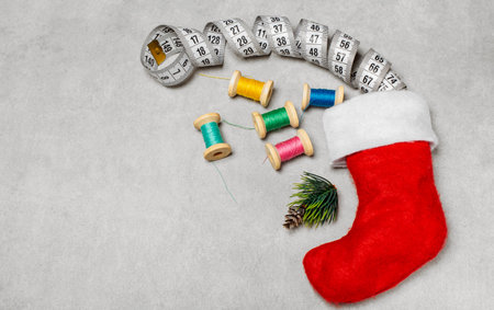 Sewing threads on wooden spools. New Year.の写真素材