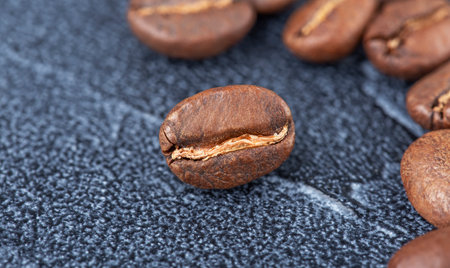 background of fresh roasted coffee beans, top viewの写真素材