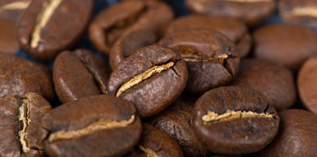 background of fresh roasted coffee beans, top viewの写真素材
