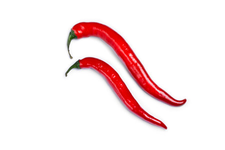 red hot chili peppers isolated on white backgroundの写真素材