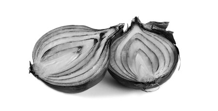 onion cut in half on white background Close-up.の写真素材