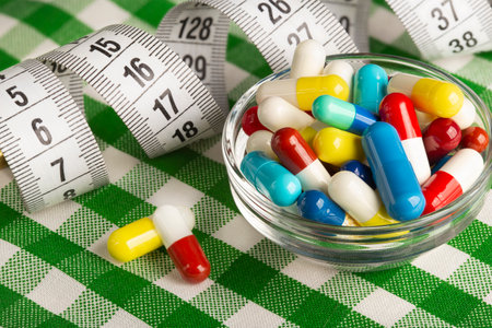 medical tablets of different colors for weight lossの写真素材