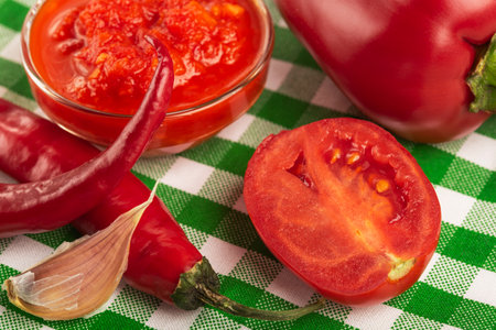 tasty and healthy spicy adjika with pepperの写真素材