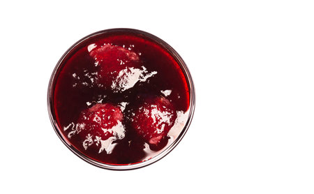 jam in glass bowl top view isolated on white background