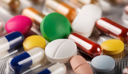 Close-up of pharmaceutical drugs in blister packs.の写真素材