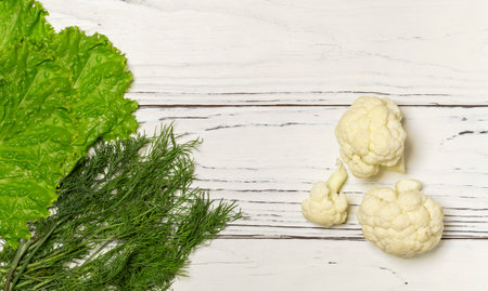 fresh dill cauliflower and green salad top viewの写真素材