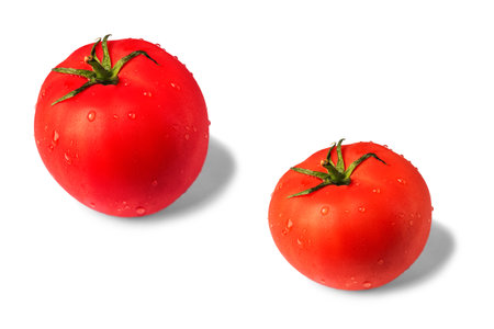 big red tomatoes isolated on white backgroundの写真素材