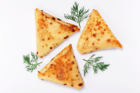 Delicious triangles with filling on a white background