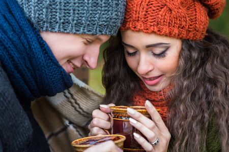 young couple with cup of coffeeの写真素材