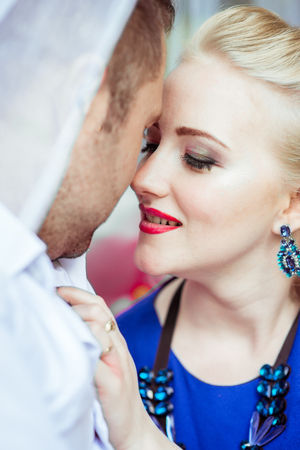 A couple on bed in meadowの写真素材