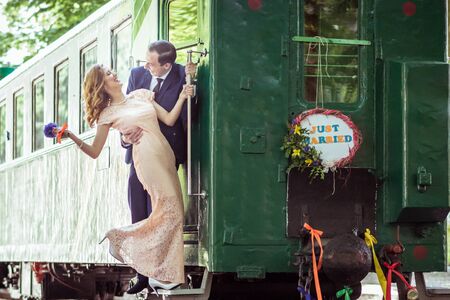 Couple on a ladder of wagonの写真素材