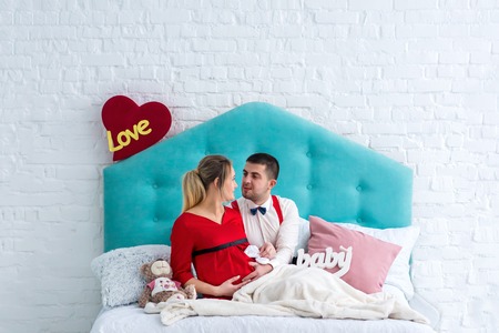 Couple lying on bed