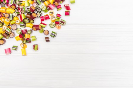 A corner frame made of colored caramel candiesの写真素材