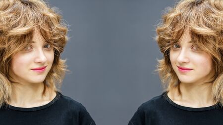 Beautiful woman with curly hairstyle on gray background, copy space.
