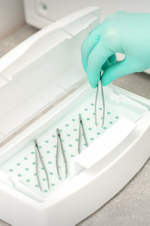 Hand disinfects tweezers with cleaning systems for medical instruments. Ultrasonic cleanerの写真素材