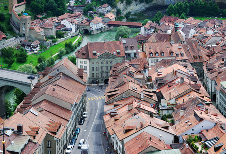 Fribourg is located on both sides of the river Sarine on the Swiss plateau 
