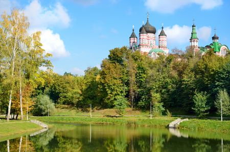 Feofaniya is the youngest garden in Kiev . This is a beautiful sample of the landscape architecture  Panteleymonovsky cathedral towers under it の写真素材