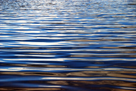 Quiet blue water with waving surface 