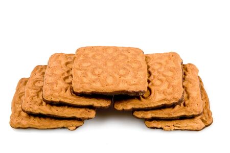 Heap of fresh cookies isolated on a white background