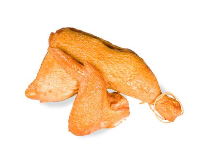 The smoked wing and log of  hen is isolated on  white background.の写真素材