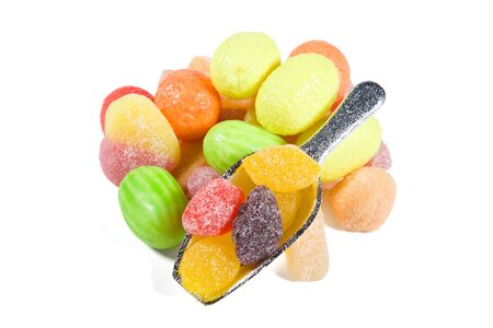Multi-colored sweets and chewing gums on white backgroundsの写真素材