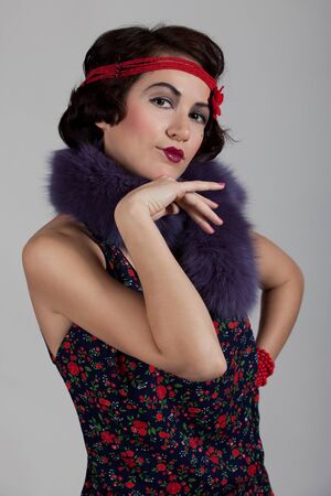 Beautiful young woman in the style of 1920-1930