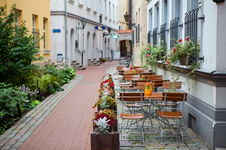 Latvia, the old town of Riga, a little street cafeの写真素材