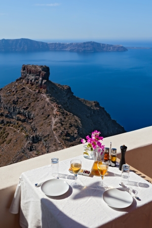 Table above sea for two  Greece, Santorini islandの写真素材