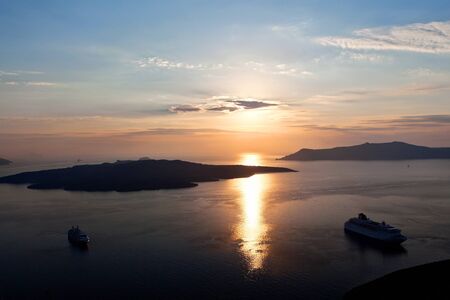 Caldera of Santorini island at sunset  Greeceの写真素材