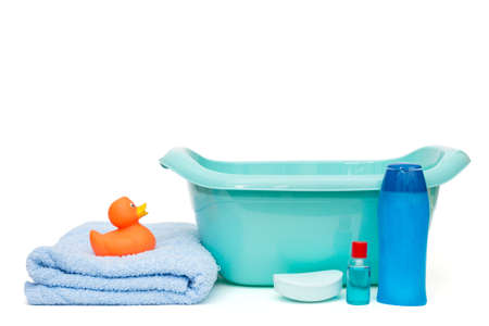 Blue basin and everything for bathing the baby, isolated on a white backgroundの写真素材