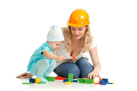 little girl and mother with building blocksの写真素材