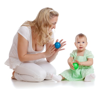 mother and her child massage with rubber devicesの写真素材