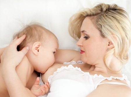 mother breast feeding her childの写真素材