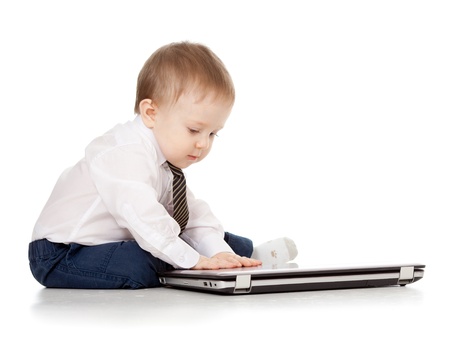 Child using a laptopの写真素材
