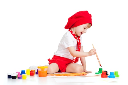 small artist child painting with brushの写真素材