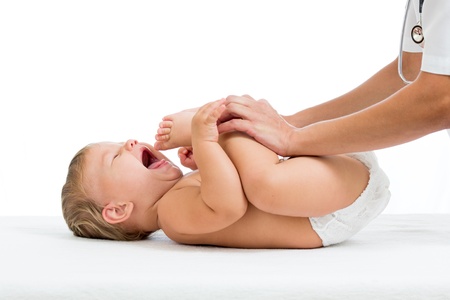 doctor doing gymnastics baby girlの写真素材