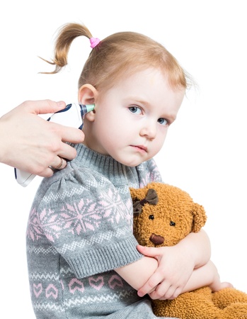 doctor measuring  temperature cute baby girl isolated on white backgroundの写真素材