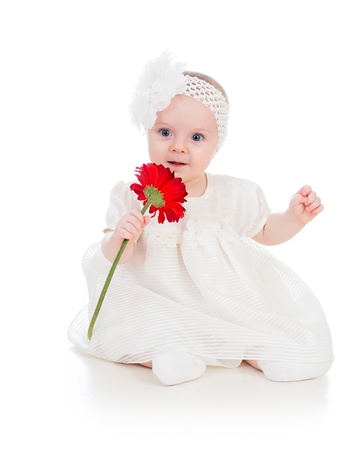 baby girl with flower giftの写真素材