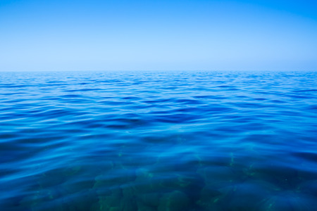 Calm sea and blue clear sky in summer dayの写真素材