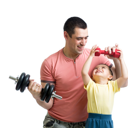 man and son doing exercise with dump-bellsの写真素材